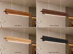 Modern linear wooden pendant light shown in four full-structure material finishes arranged in a 2×2 layout: Teak Wood, Walnut Wood, Oak Wood, and Black Oak Wood. Each version has the entire body in the same matching wood finish with warm integrated LED lighting in a minimal interior setting