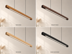 Unikaa modern linear wooden pendant light shown in four premium wood finish options: Teak Wood, Walnut Wood, Oak Wood, and Black Oak Wood, displayed in a minimal interior setting with warm ambient lighting.