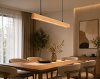 UNIKAA modern linear wood pendant light for dining room installed above dining table in a warm modern interior