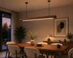 UNIKAA modern linear wooden pendant light for office space styled in a modern living and dining area with warm ambient evening lighting.