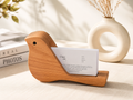 UNIKAA wooden bird business card holder on modern office desk with business cards, premium solid wood desk organizer and office decor